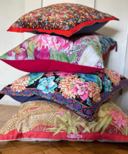 Various cushions by CLS Cushions. An exhibitor at Craftworks.