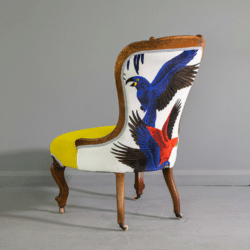 Chair with parrot fabric by Jay and Co. Jay and Co are exhibiting at Craftworks show 2024