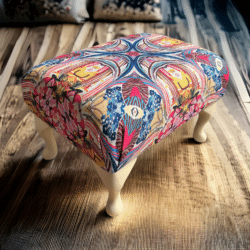 Classic Floral Footstool with cream legs three quarter view by Kingfly Embroidery, an exhibitor at Craftworks.