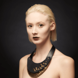 Leather Necklace worn by model by Renata Koch. An exhibitor at Craftworks. Renush is represented at Craftworks by Design-Nation.
