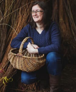 Sarah of Hatton Willow with her handmade basket. Hatton Willow is an exhibitor at CraftWorks