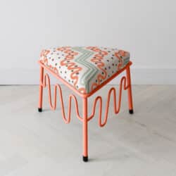 Orange low stool by Fox & Furb. An exhibitor at Craftworks