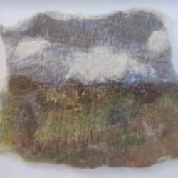 Feltmaking art of a landscape created by Susanna Wallis, an exhibitor at Craftworks.